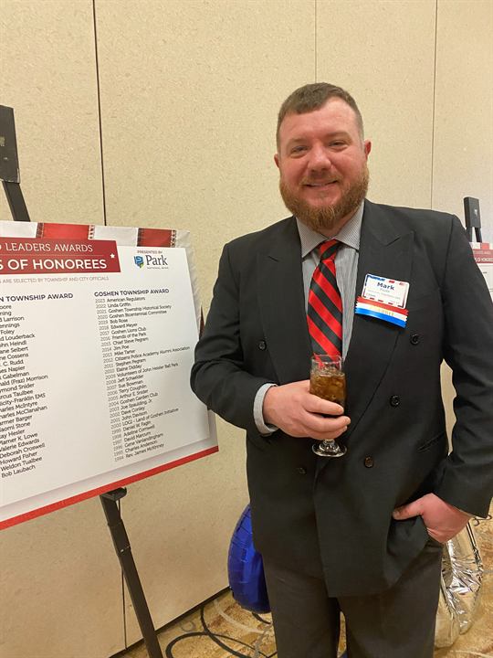 An American Regulators representative at an honorees recognition event
